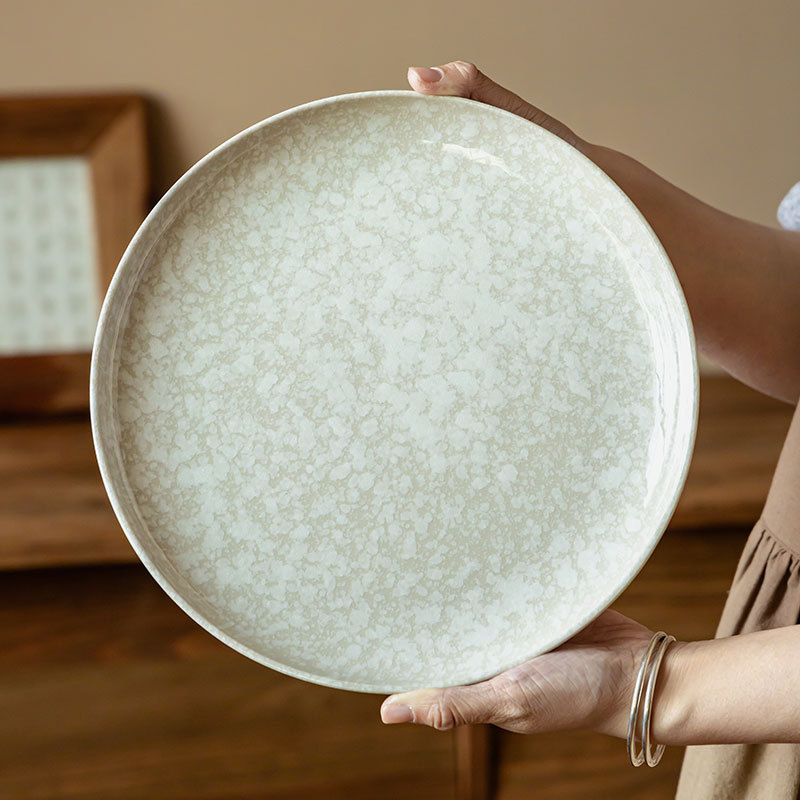 Plato de cerámica de alto valor de superficie, plato de piedra de nieve, plato de comedor doméstico, plato de platos, platos de platos de comedor al por mayor