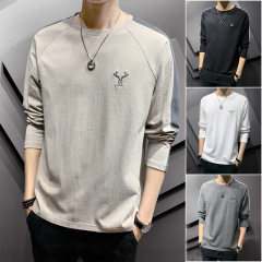 春と秋の新型長袖tシャツ男性のファッション丸首がゆったりしています。