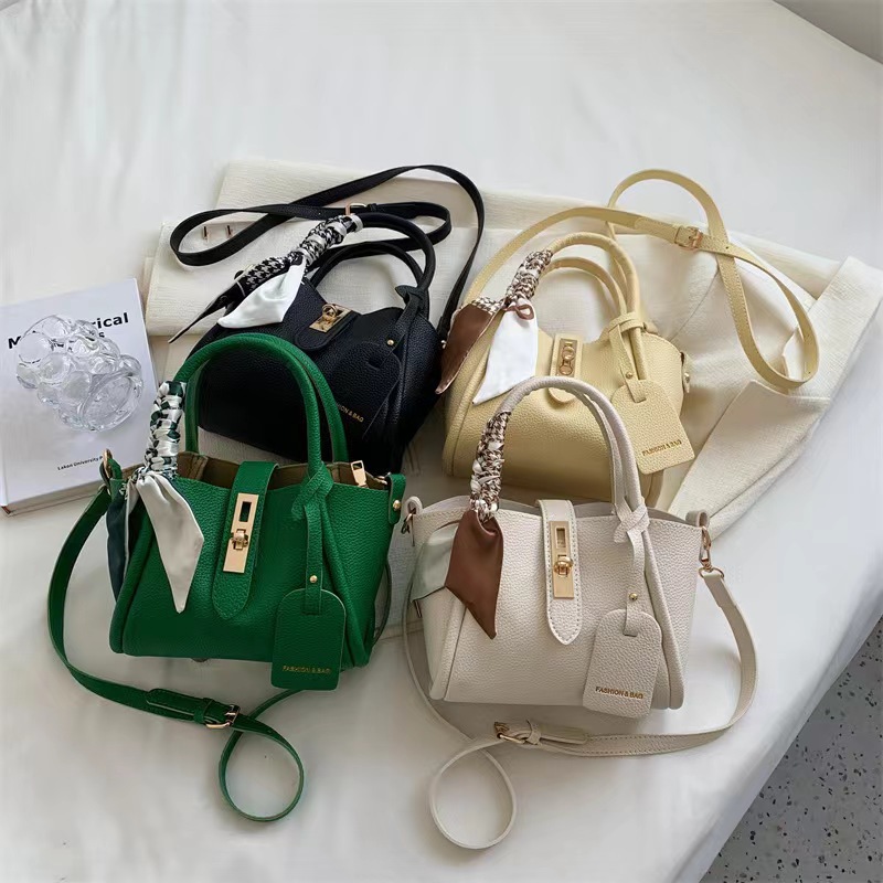 Este año, la popular bolso de mujer de cubo 2024 nicho de diseño de estilo extranjero versátil bolso de hombro simple versión japonesa y coreana