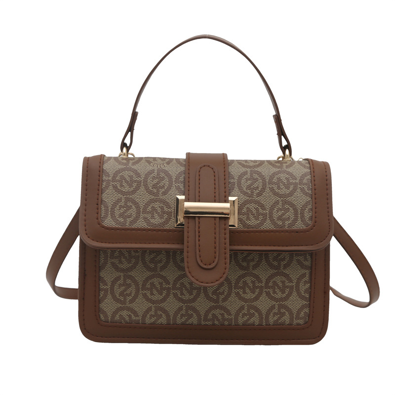 Bolsa de mano de moda coreana de moda 2025, primavera nueva bolsa de hombro de viaje de moda retro impresión mochila