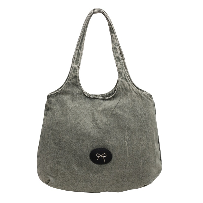 Bolso de viaje retro de mezclilla de alta gama, bolso de viaje de marca de moda de moda femenina, bolso de axila de hombro simple y casual de gran capacidad