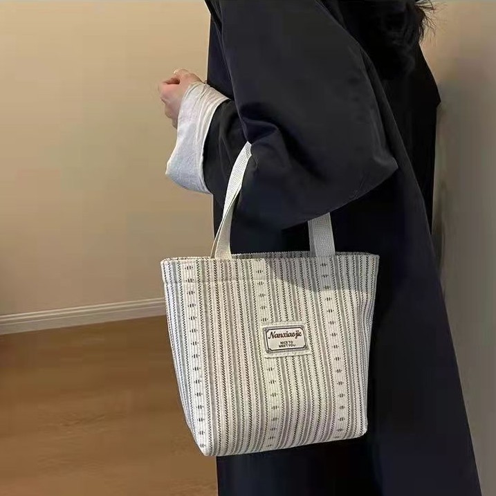 Ins bolso japonés de mujer gran capacidad bolsa de lona de moda rayas de hombro bolsa especial de clase de alto valor facial bolsa de viaje