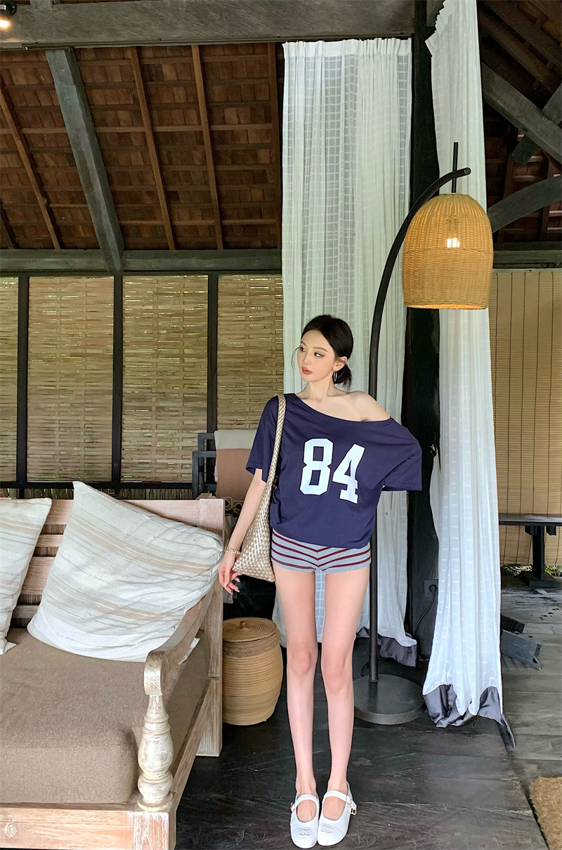 Copy_Navy blue printed slanted shoulder short-sleeved T-shirt for women in summer, lazy and loose American style.jpg