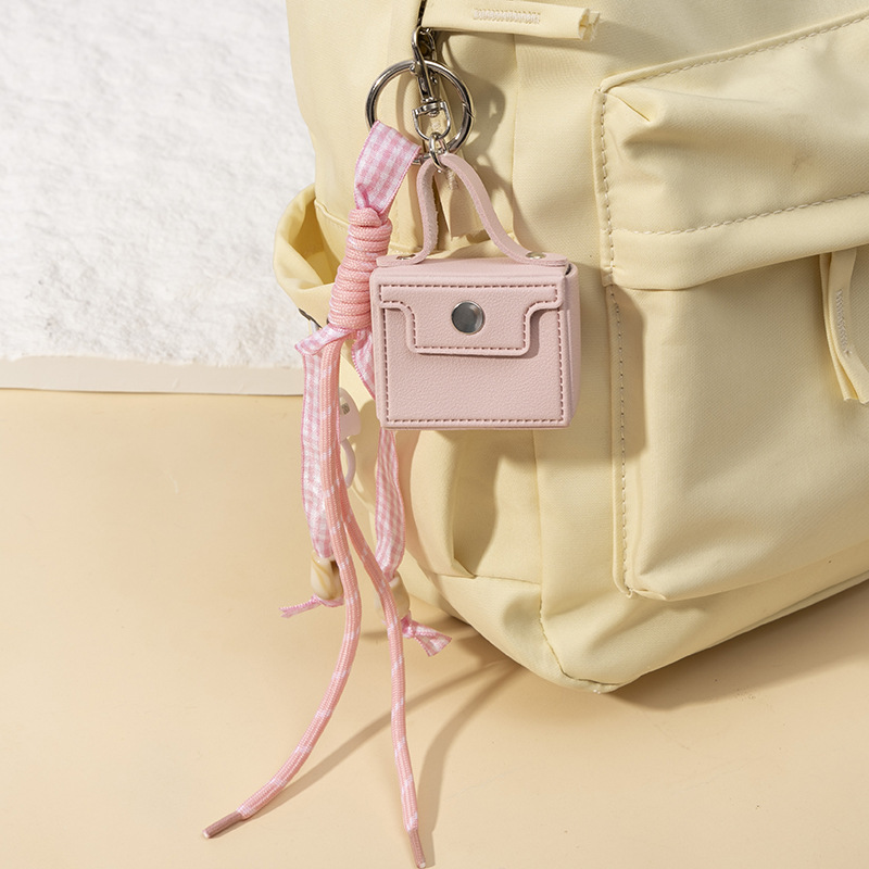 Nuevo bolso transfronterizo monedero llavero cuerda anudada colgante linda niña exquisito pequeño regalo al por mayor