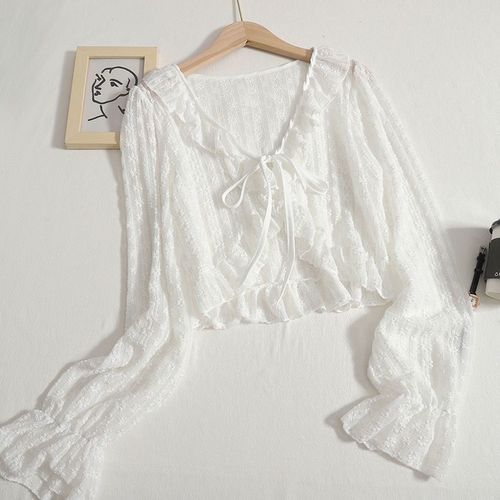 Apricot-colored lace ruffled sun-protection cardigan coat—thin, cropped, and ultra-fairy-like with a delicate tied-strap design for a sweet, gentle vibe.