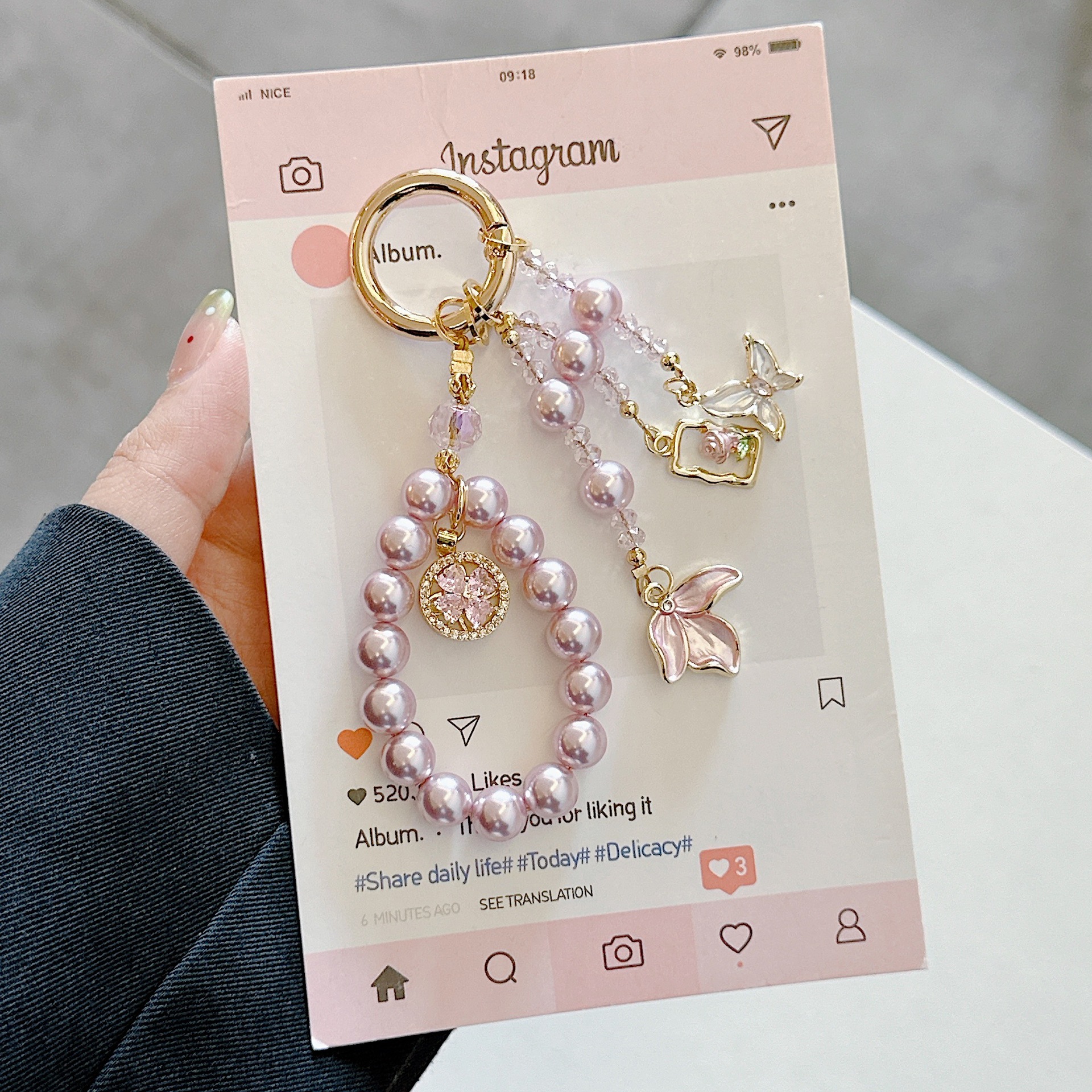 Cadena colgante de teléfono móvil de alta gama hecha a mano de boutique, cadena colgante de conejo giratoria de pétalos, cordón de teléfono móvil de moda, colgante de cadena corta