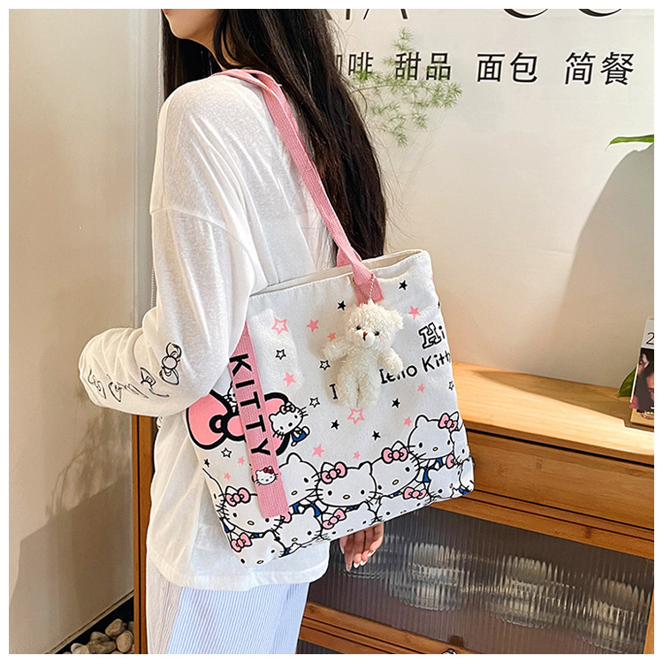 The new fashionable cartoon canvas bag, simple and versatile tote bag, cute commuting single-shoulder tote large bag, is selling well across borders undefined