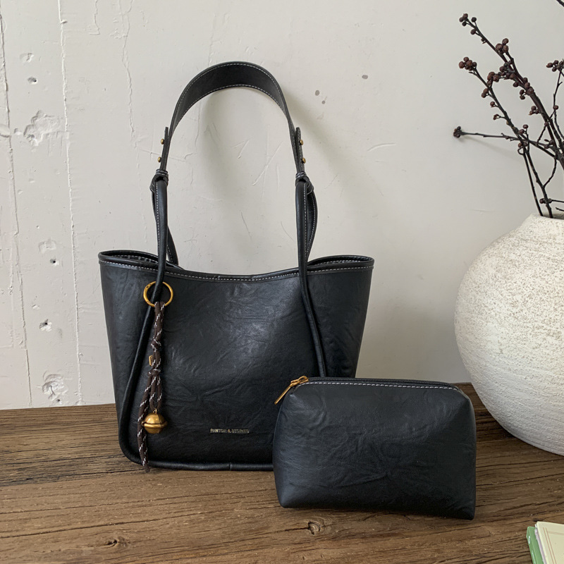 Bolso de mujer venta caliente nuevo nicho coreano bolso de cubo de alta capacidad de sensación universal bolso de moda para niños bolso de hombro