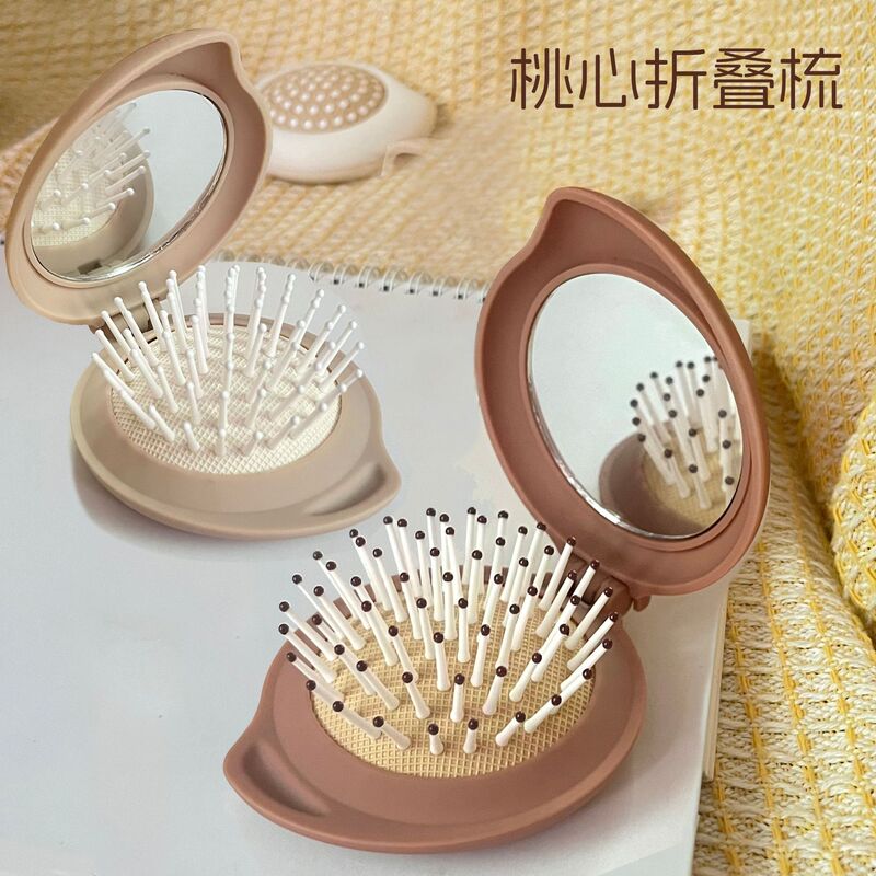 かわいいミニポータブルエアクッションコームミラーツーインワンポータブル折りたたみエアバッグコーム頭皮マッサージコーム女性用|undefined