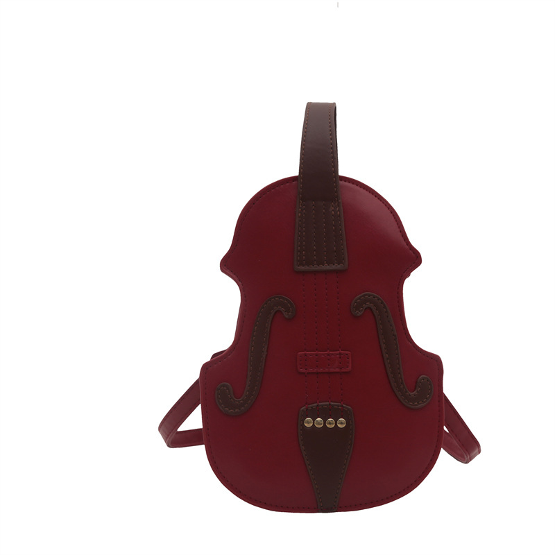 Europa y Estados Unidos personalidad órgano guitarra mochila de invierno para mujeres 2024 nuevo estilo extranjero bolso de hombro creativo de moda violín