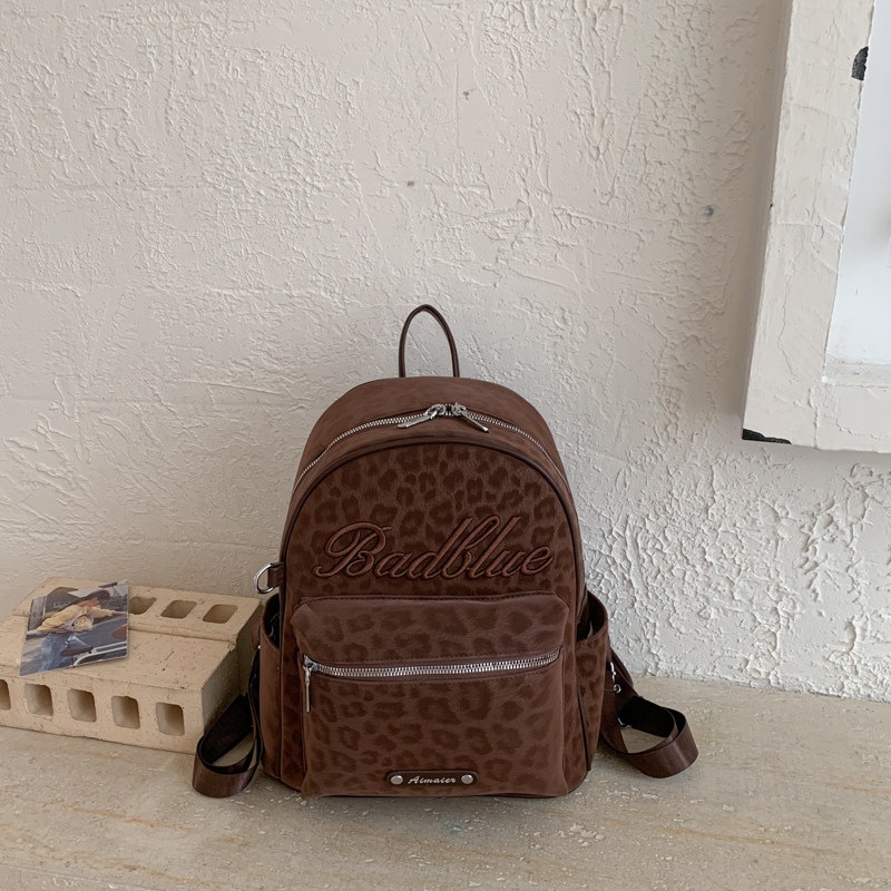 Estudiantes exquisitos nicho nuevo mochila 2026 popular mochila de hombro para viajar estampado de leopardo simple mujer gran capacidad de verano