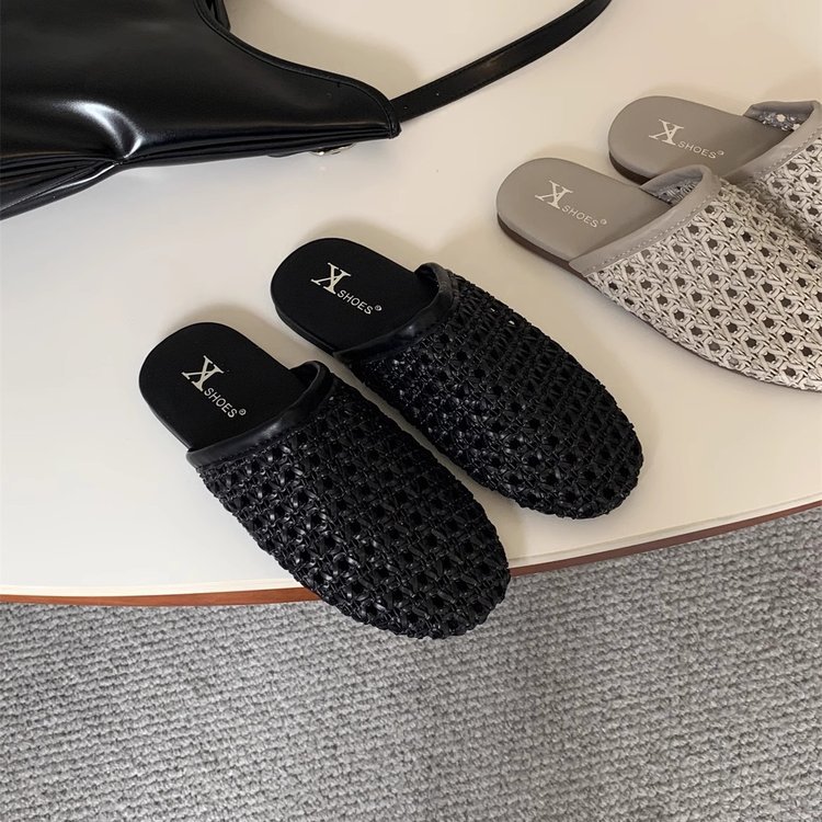 Versión de cuero suave tejida transpirable de un pie Mu Qin Boken zapatos exteriores 2025 verano nuevo estilo plano puntera media pantufla
