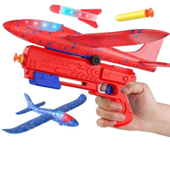 Children's chattering net red catapult aircraft gun toy wholesale luminous boys and girls soft bomb foam aircraft glide