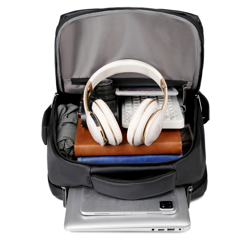 Color sólido transfronterizo de alta calidad sensación de mochila de gran capacidad USB colgar varilla de tracción bolsa de computadora de negocios mochila de negocios a prueba de rociadores