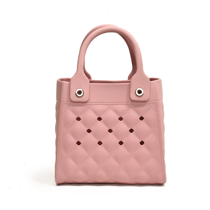 Bolso Tote de moda coreana 2025 verano nuevo estilo bolso femenino agujero hueco bolso de mano moda ringge bolso de playa marea