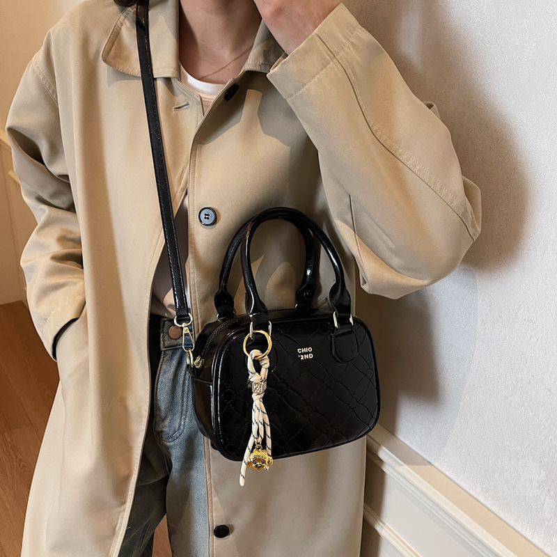 Este año, la popular explosión de bolsos de mano para mujeres 2025, nueva moda universal, bolsos de hombro, bolsos de béisbol de moda de textura