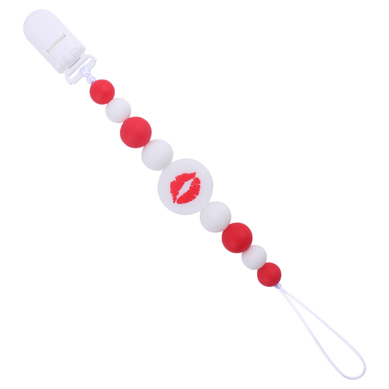 Nuevo bebé suministros de dibujos animados de impresión redonda amor creativo DIY silicona mordedura molar pezón cadena anti-caída