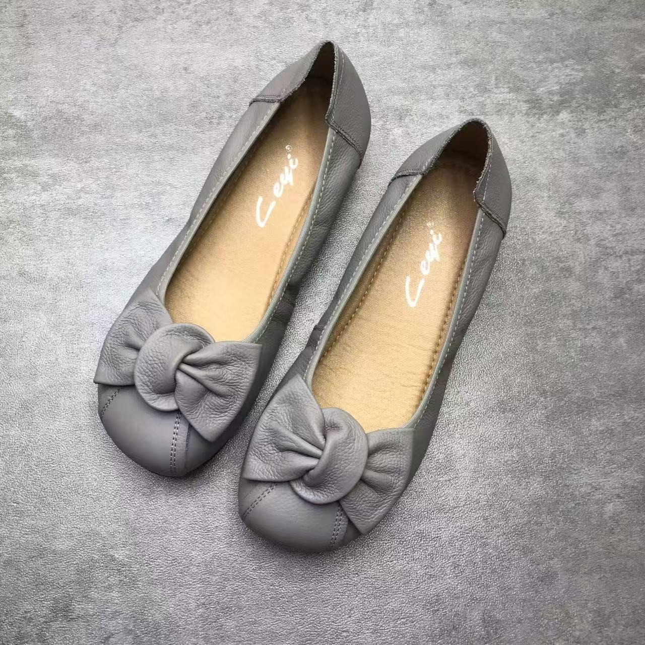 2026 nuevo primavera y verano arco suave cómodo y ligero zapatos de moda simple zapatos anti-deslizantes superficiales zapatos de mamá