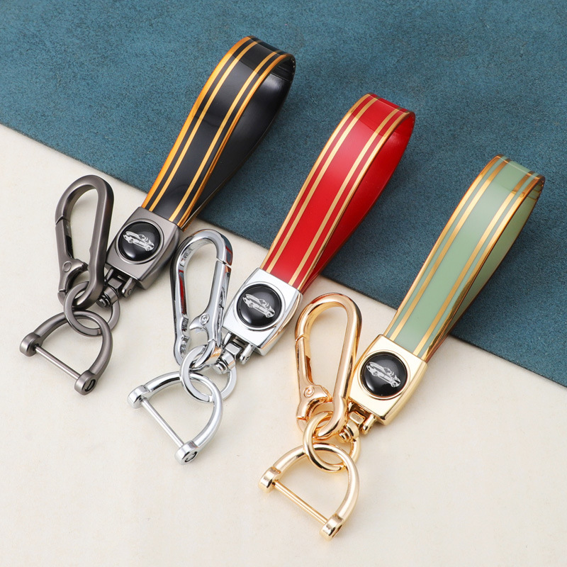 Cross-border silicone hand rope car keychain car logo surname key ring anti-loss durable silicone hand rope key buckle