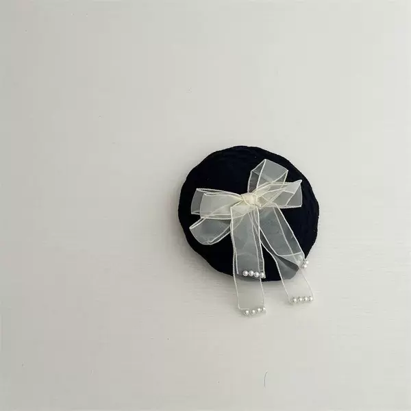 With bow, black