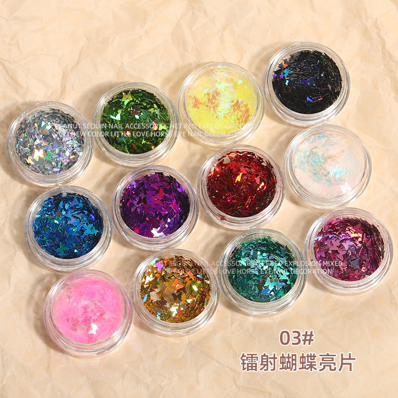 Celebridad en línea láser mariposa lentejuelas nuevo Ojo de caballo rectangular ultra-delgada magia flash uñas joyería 12 colores mezclados traje