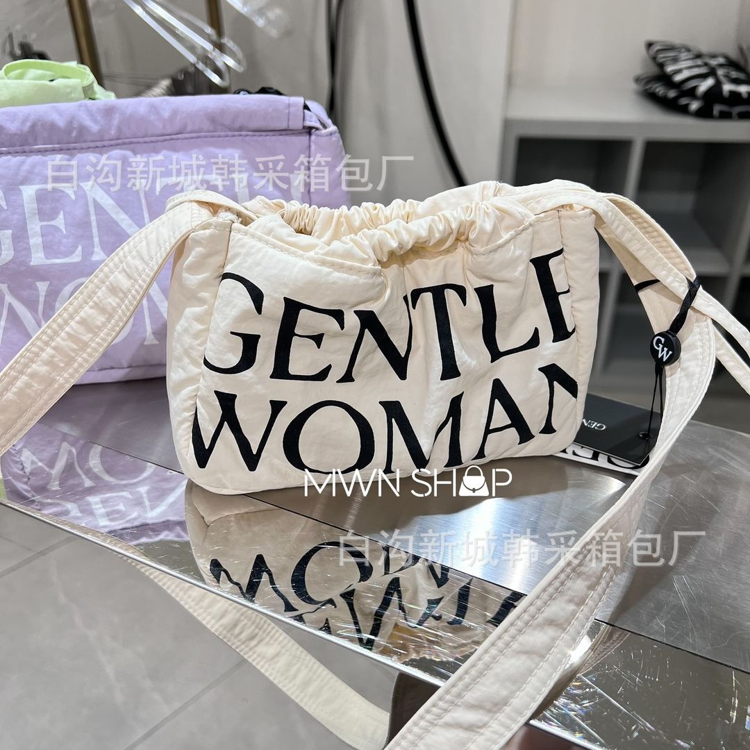 Diseño de nicho de mini albóndigas de la marca tailandesa de moda Gentle Woman 2024 nuevo bolso de hombro con cuerda de extracción