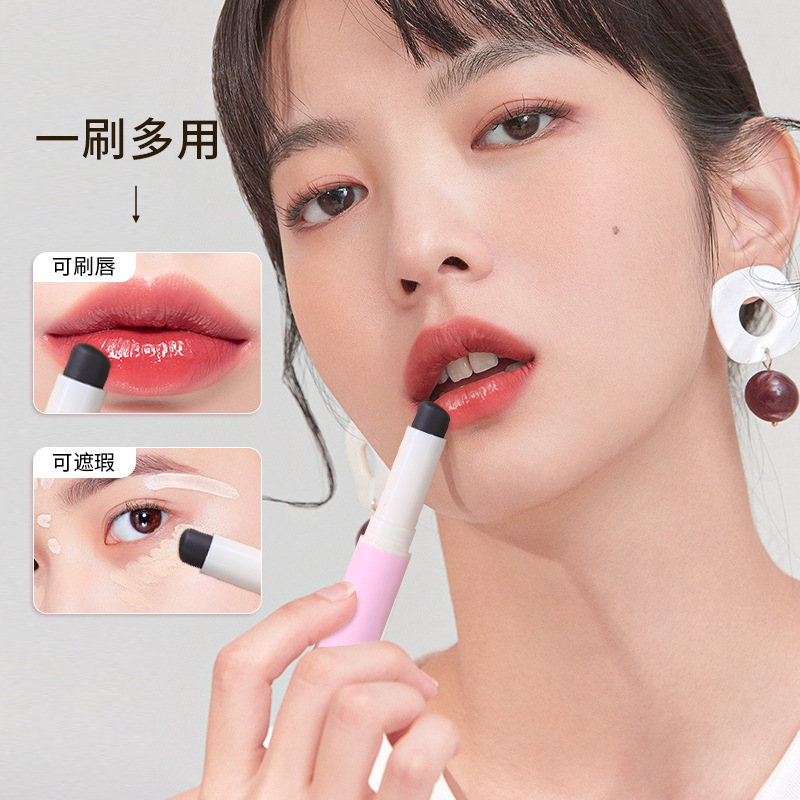 Lápiz labial en forma de cepillo de labios de silicona retráctil Q suave portátil a prueba de polvo mini lápiz labial brillo de labios floreciente cepillo de maquillaje con tapa