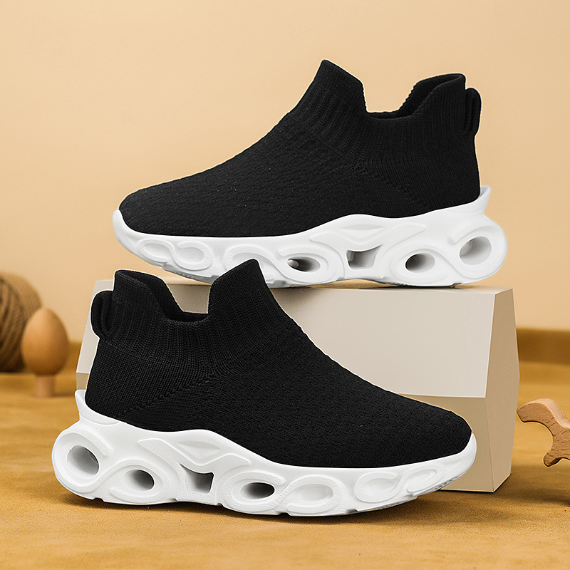 Transfronterizos niños zapatos deportivos de tela de vuelo primavera y verano nuevos niños y niñas malla transpirable ligera universal zapatos de calzado de tela de un pie