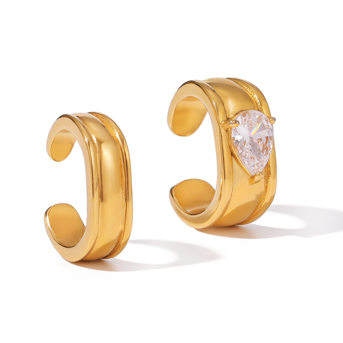 Wanxing Europa y los Estados Unidos gotas de agua Zircon orejas de orejas mujeres sin agujeros de orejas de acero inoxidable 18K diseño de nicho de joyas transfronterizas