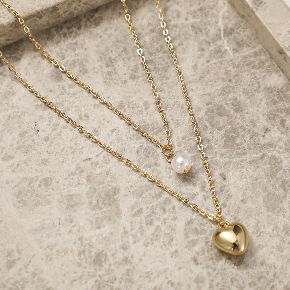 Collier cœur en perles multicouches, style européen et américain, collection 2021 : bijoux féminins simples, rétro et créatifs, inspirés des styles européen et américain._voghion.com