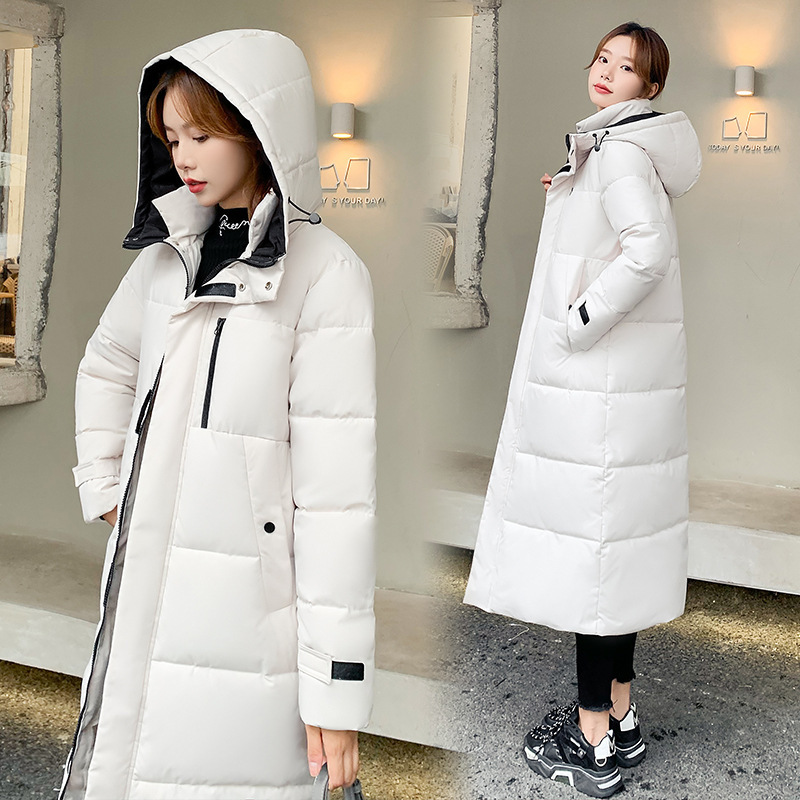 Nuevo comercio exterior 2023 ropa de algodón coreana mujer invierno largo encapuchado rodilla ropa de algodón damas gruesa abrigo de algodón blanco