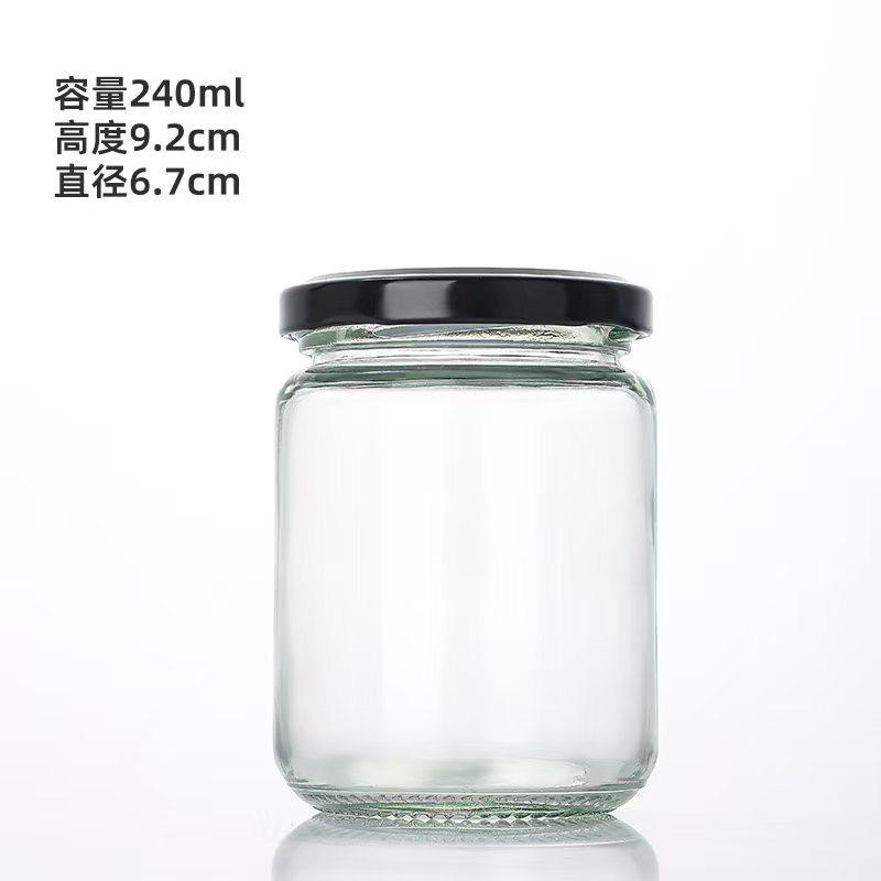 Botella de vidrio al por mayor botella vacía de grado alimenticio hervir botella de conservación de miel mermelada botella de hongos shiitake