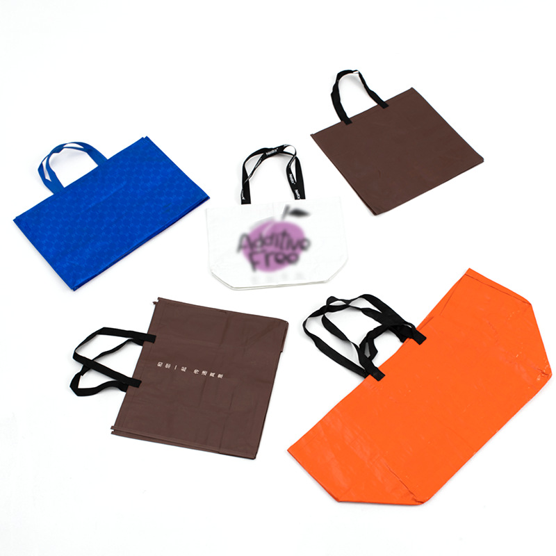 Bolsas de tejido en blanco portátiles personalizadas logotipo impermeable PP bolsa de plástico ropa de piel de serpiente bolsa de compras procesamiento