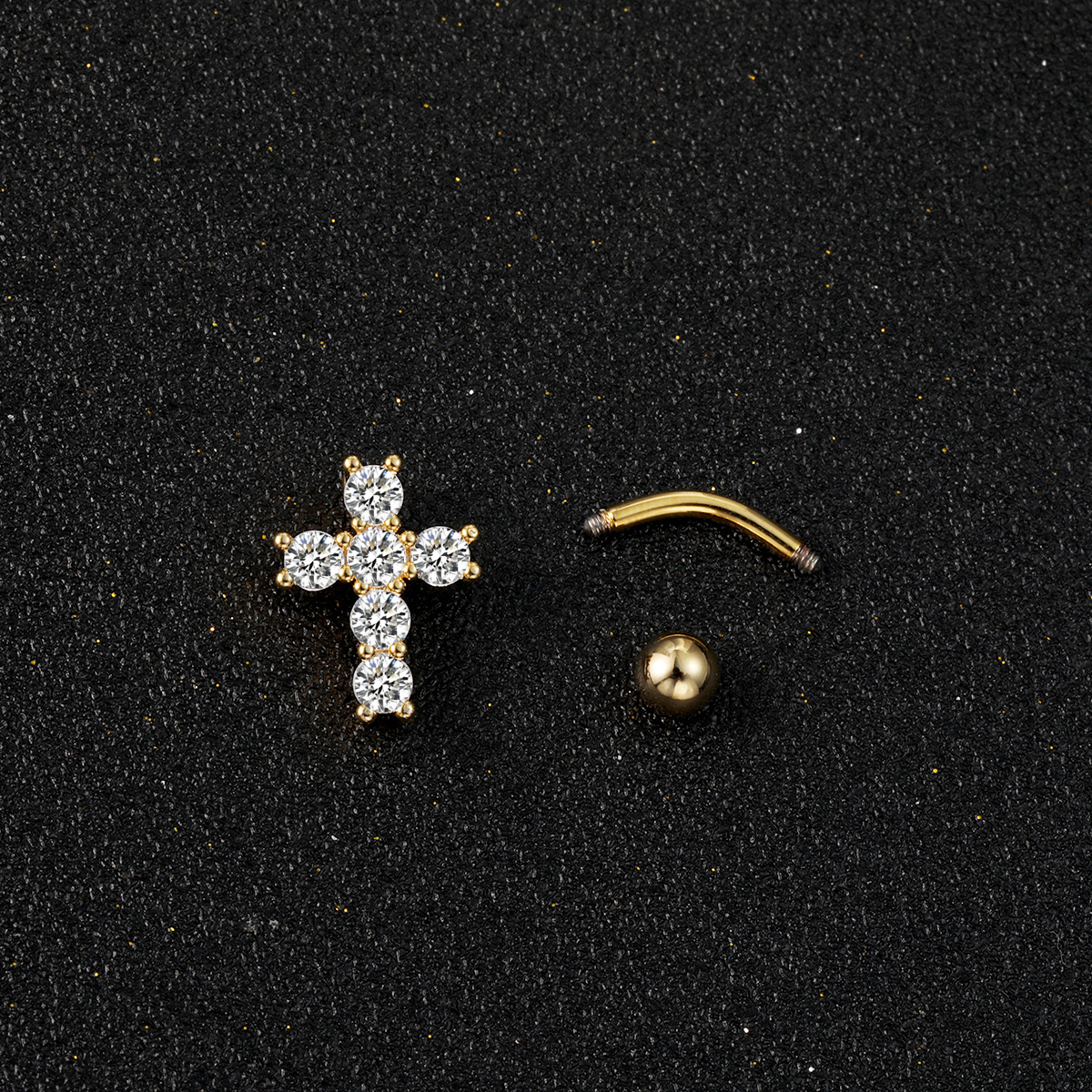Moderne navlepiercing smykker med kors-pigg og stener_voghion.com