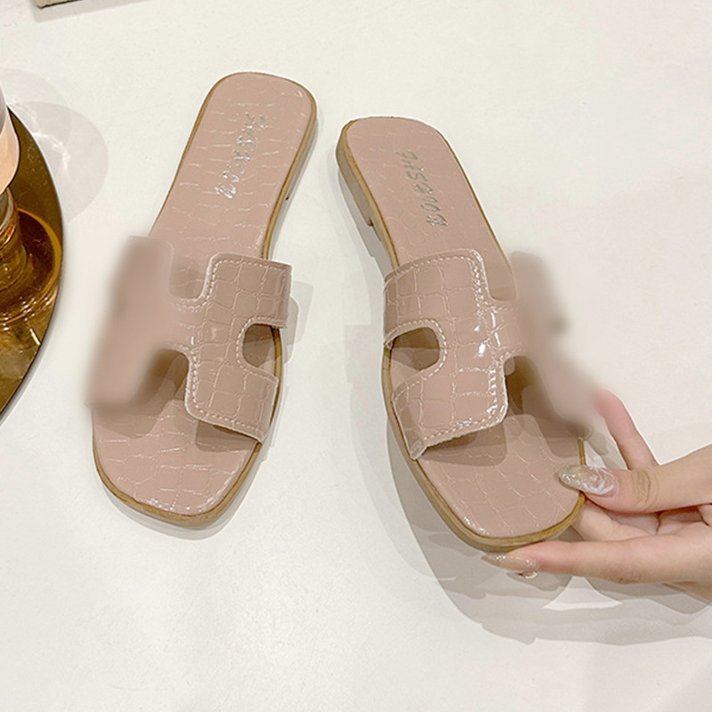 ファッションの新型のサンダルの外は女性の高級感の平底のスリッパの海辺の砂浜の柔らかい底の冷たいスリッパのメーカーの卸売りを着ます。|undefined