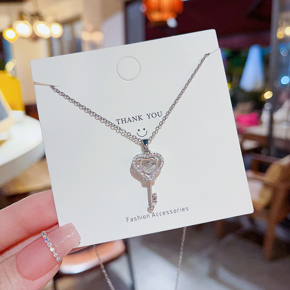 Streetwear Heart Shape Key Titanium Steel Copper Inlay Artificial Gemstones Pendant Necklace display picture 1