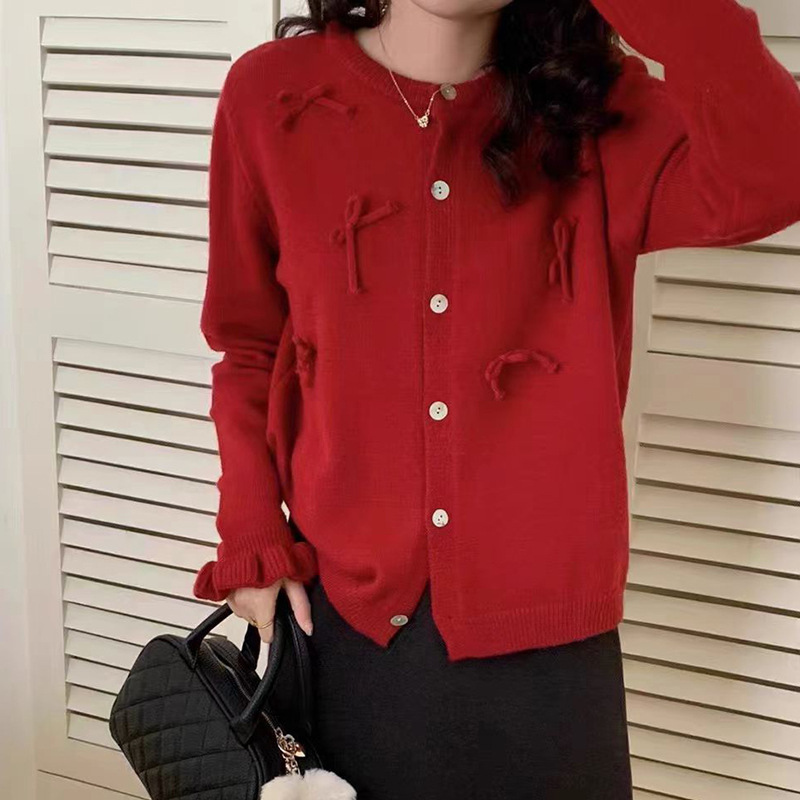 Autumn cardigan with bow with a round collar