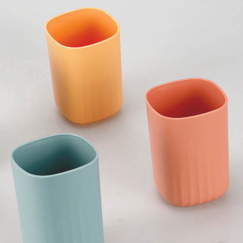 Sencillo Estilo nórdico cepillo de dientes taza baño color sólido onda patrón plástico cepillo de dientes almacenamiento taza de lavado simple enjuague bucal taza