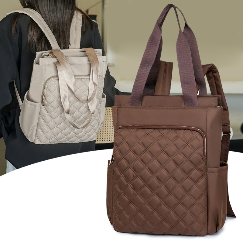 Mochila de mujer salvaje de color puro 2024 nueva mochila portátil de moda, bolso de viaje ligero y de gran capacidad