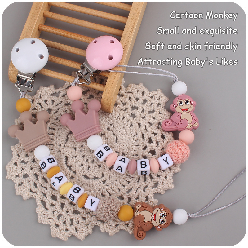 Nuevo bebé suministros de dibujos animados animal mono mordedor creativo bebé DIY mordedura molar Cadena de pezón cadena anti-caída