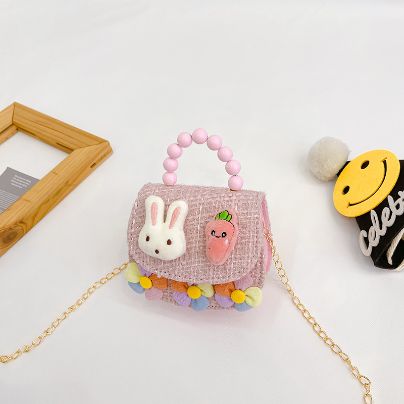 2022 nuevos niños bolso de hombro crossbody Chanel estilo niñas bolsa perla portátil accesorios de dibujos animados bolsa de desgaste