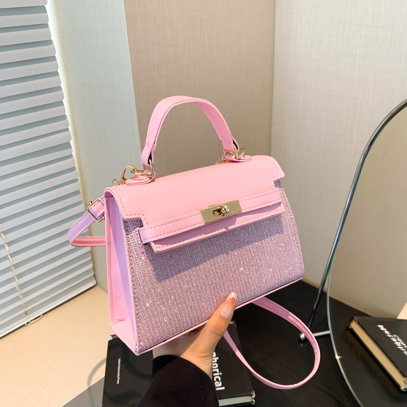 Bolsa pequeña de estilo extranjero para mujeres 2024 nuevo estilo de mano popular coreana de hombro de un solo hombro para viajar sensación de alta calidad bolso Kylie