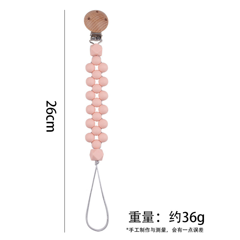 Productos para bebés Clip de chupete de madera de haya Cuentas de colores de dibujos animados para bebés creativos Morderse los dientes Cadena de chupete anti-caída
