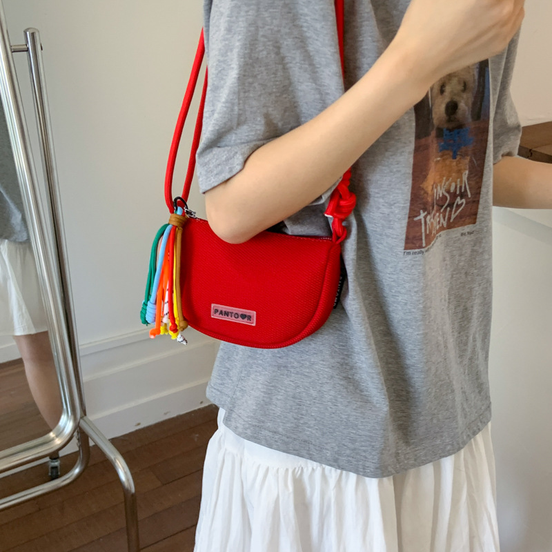 Bolso de lona de moda coreana 2025 verano nuevo bolso femenino casual estilo universitario bolso de hombro bolso de mensajero de malla hueca
