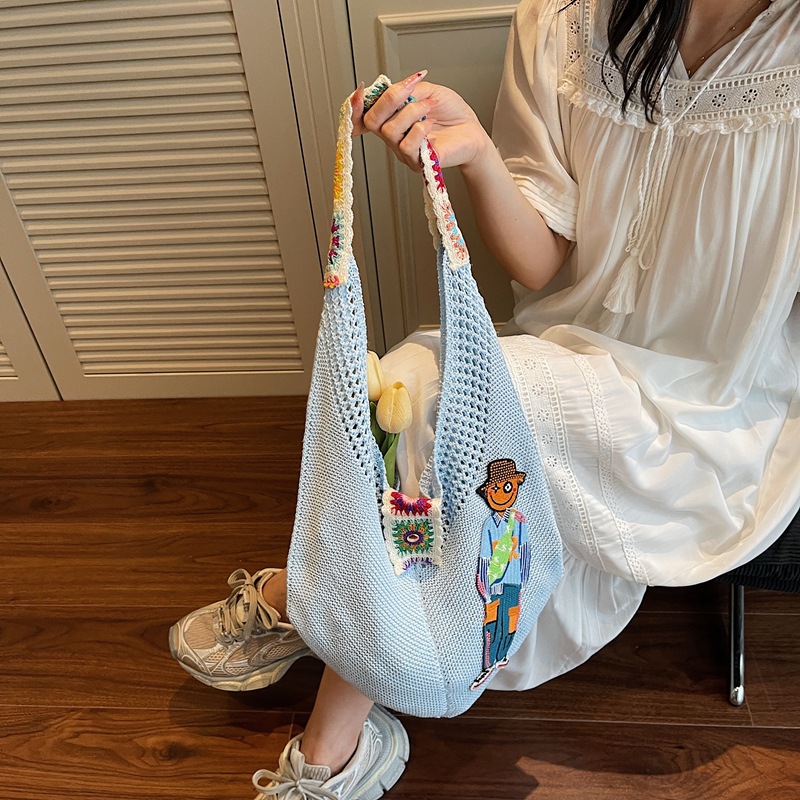 Versión coreana del bolso de nicho 2025 verano nuevo bolso femenino bolso tejido perezoso bolso de hombro casual de gran capacidad