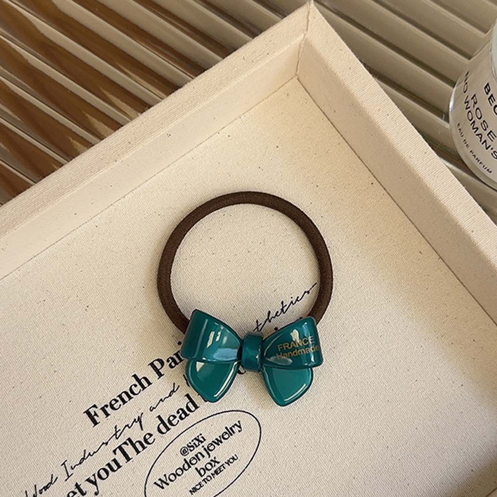 Coreano oro acético adorable arco de cabello anillo de cabello cuerda elástica cuerda de cabello duradera mujer