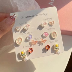 甘い花と蝶のイヤリングセット、チューリップの気質と多用途の真珠と隕石の絶妙な女性用イヤリングを 1 週間組み合わせてセット