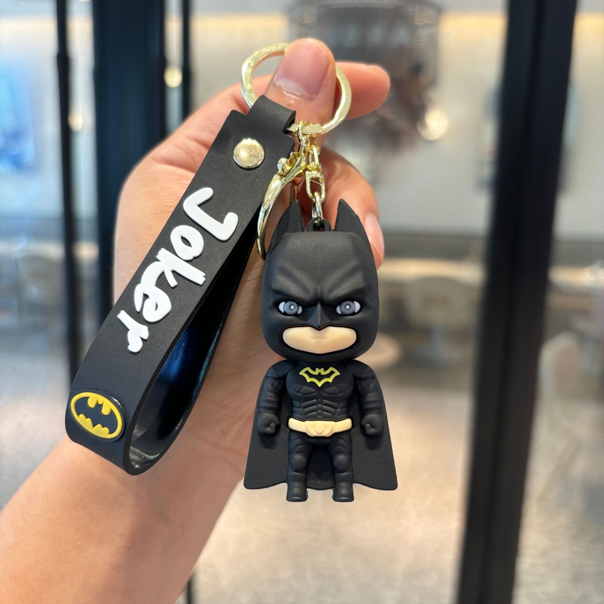 Batman cruzado superhéroes clown muñeca coche llavero colgante muñeca máquina de regalo pequeño