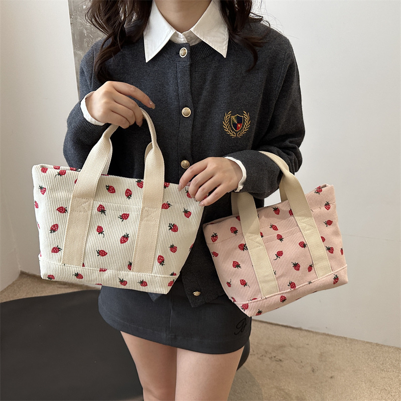 2024 otoño nueva gran capacidad simple moda encantadora impresión de fresas de moda coreana bolsos de chicas de estilo universitario