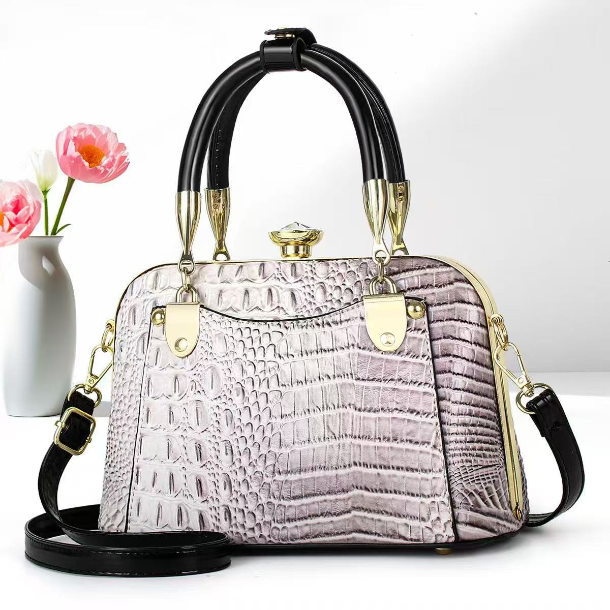 Bolsos de mujer verano nuevo estilo bolso de madre bolso de hombro de mediana edad bolso de mensajero de nicho de regalo de todo fósforo